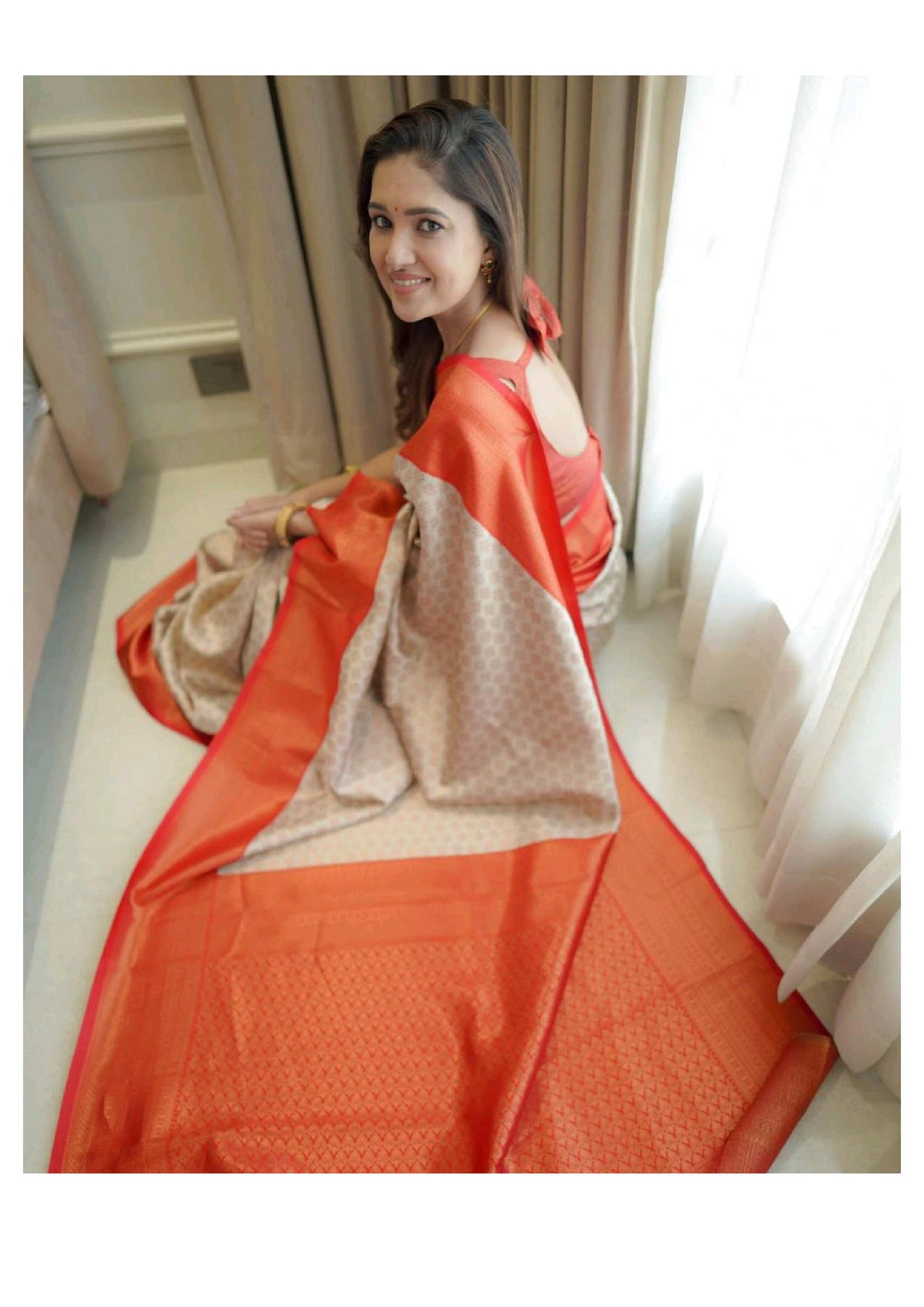 Graceful Cream & Orange Cotton Silk Saree with Subtle Floral Weave